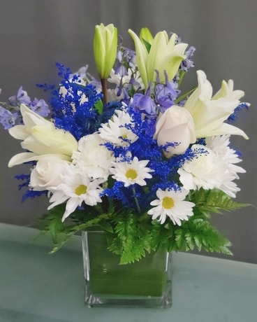 White and Blue flowers in a cube Flower Arrangement