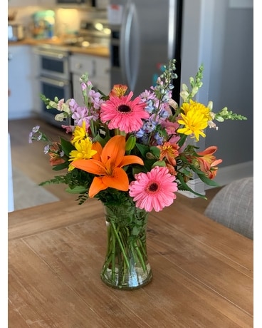 BRIGHT COLORED FLOWER ARRANGEMENTS