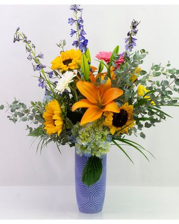 Vibrant Blue Vase Flower Arrangement