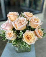 With 12 roses size,  inches height and  inches wide.