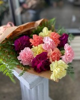 Carnations Wrapped Bouquet size,  inches height and  inches wide.