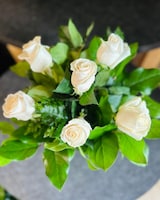 White Roses size,  inches height and  inches wide.