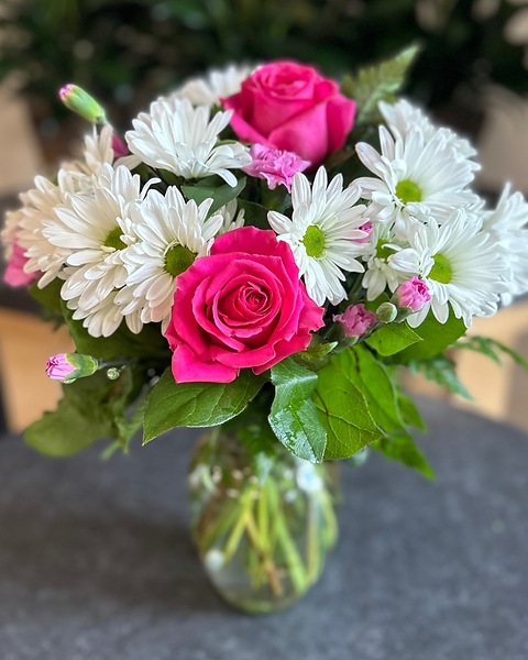 Bouquet of Pink Blooms and Daisies