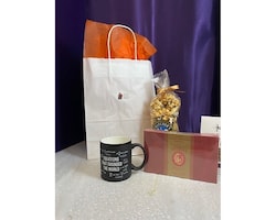 mug with chocolate, popcorn & toffee size,  inches height and  inches wide.