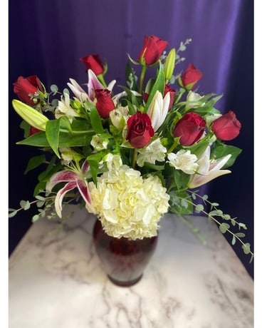 Better Than A Dozen Roses Flower Arrangement