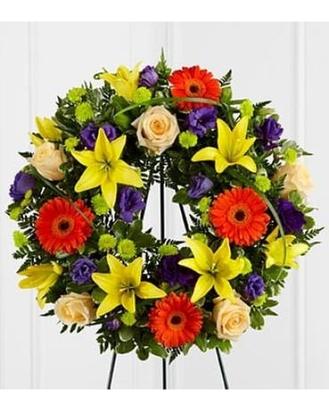 The Radiant Remembrance™ Wreath Flower Arrangement