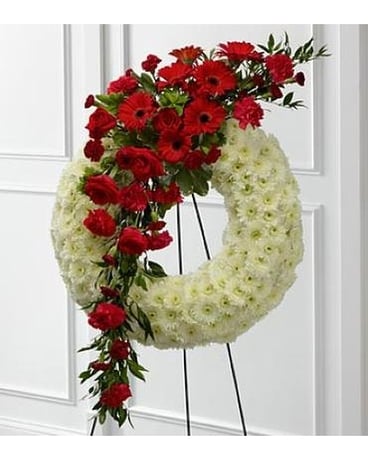 The Graceful Tribute™ Wreath Flower Arrangement