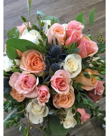 FLOWERS FOR THE WEDDING PARTY Flower Arrangement