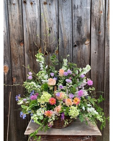 Soft Pastel Garden Inspired Sympathy Basket Funeral Arrangement