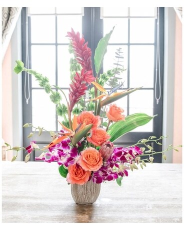 Tropicals in Stone Container Flower Arrangement