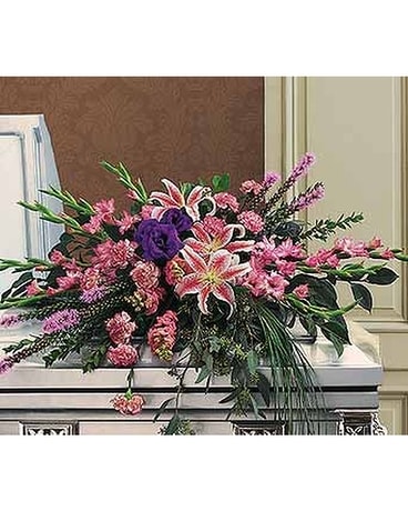 Triumphant Casket Spray - by Lary's Florist & Desi Flower Arrangement