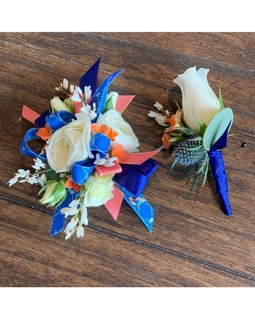 White, blue, coral Corsage