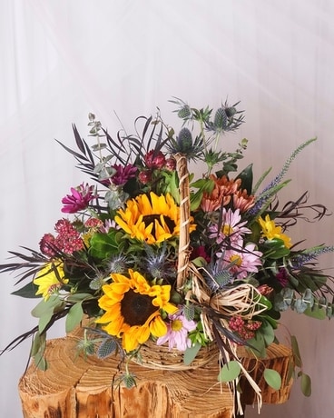 Happiest of Blooms Basket Flower Arrangement