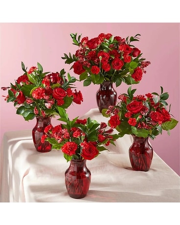 red vases delight Flower Arrangement