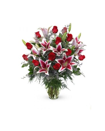 Dozen Red roses and Stargazers Flower Arrangement