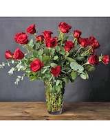 Deluxe w/extra greenery size,  inches height and  inches wide.