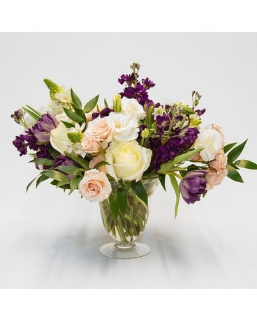 Peach, cream and purple upscale arrangement