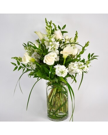 Wonderful in White is a splendid mix of the finest white flowers of the season for flower delivery in New York City from your local NYC.