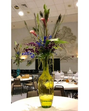 A PEACOCK CELEBRATION Flower Arrangement