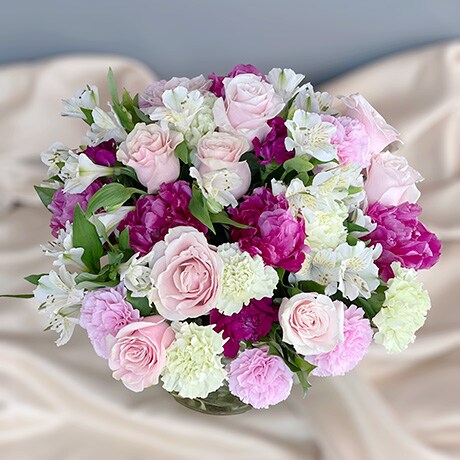 Pink & Purple Low & Lush Cube With Premium Flowers Flower Arrangement