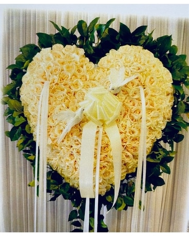B & R White Roses Bleeding Heart with Two Doves Flower Arrangement