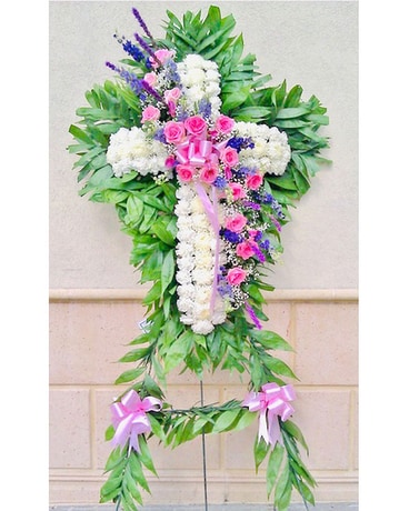 White Cross with a touch of Pink & Purple Flowers Flower Arrangement