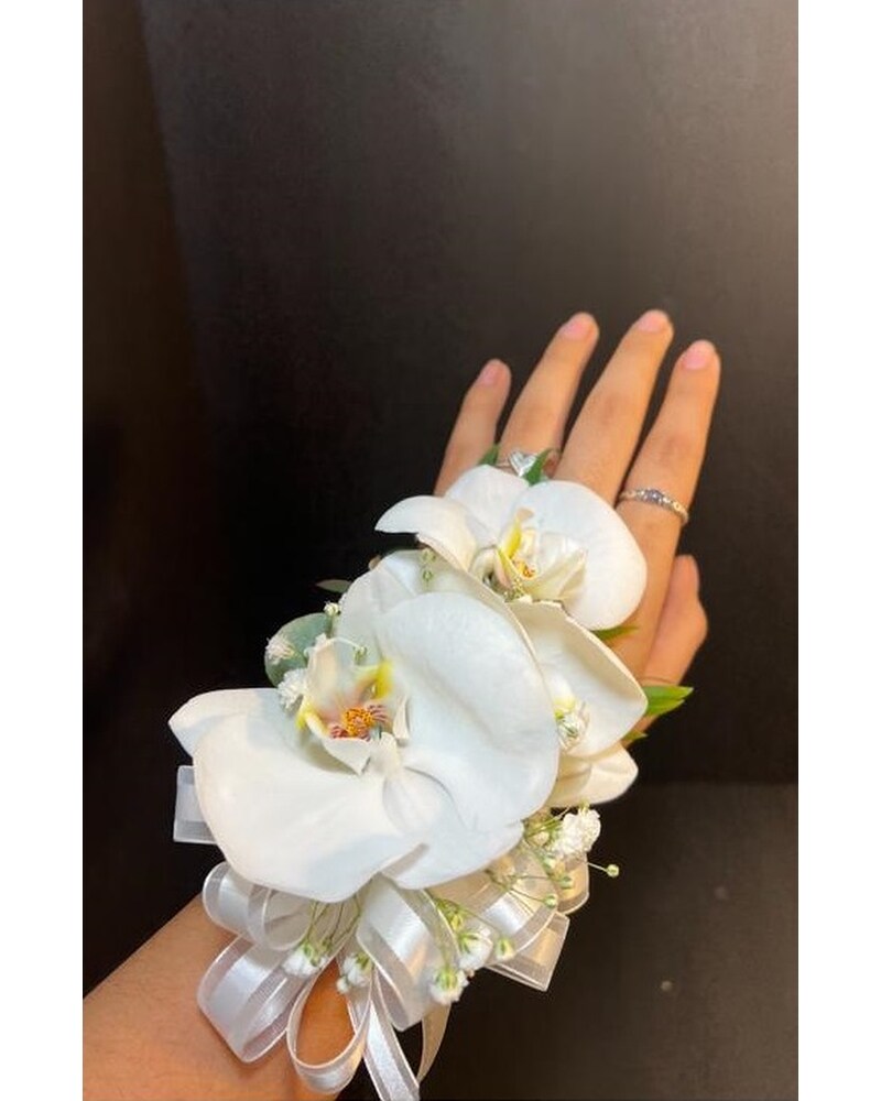 orchid corsage in Houston TX - Ace Flowers
