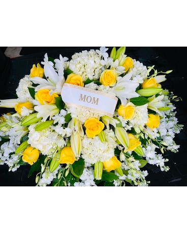 Yellow & White Casket Spray size,  inches height and  inches wide.