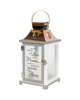 displayed with silk ivy and bow size,  inches height and  inches wide.