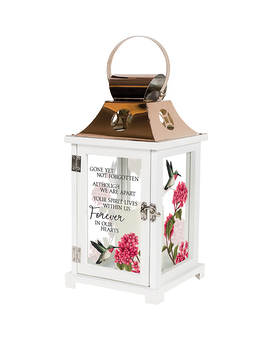 Displayed with silk ivy and bow size,  inches height and  inches wide.