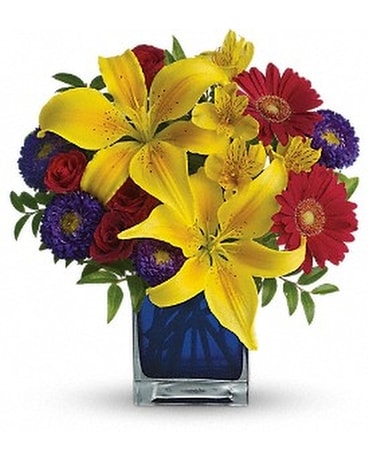 Teleflora's Blue Caribbean Flower Arrangement