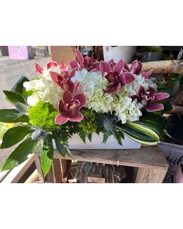Orchids and Hydrangea centerpiece Flower Arrangement