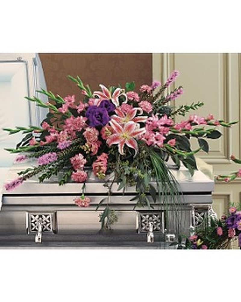 Triumphant Casket Spray by Petals & Stems (TF200-1 in Dallas TX