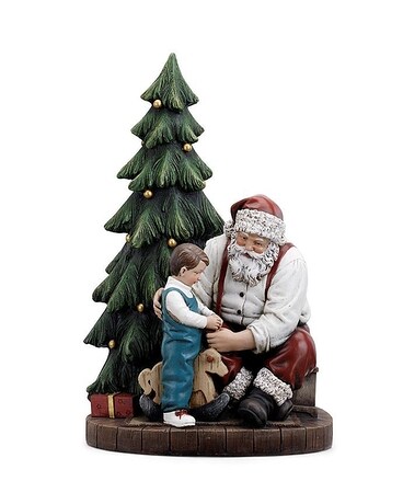 Santa and Child on Rocking Horse Flower Arrangement