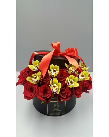 Red Rose and Green Orchid Hat Box Flower Arrangement