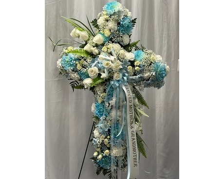 Ice Blue And White Cross Flower Arrangement