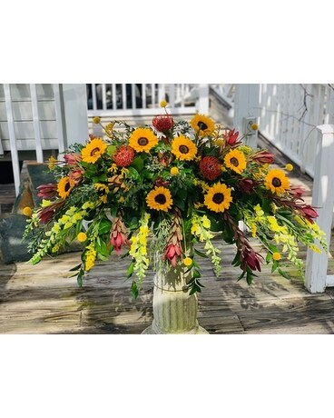 A Ray of Sunshine Casket Spray Sympathy Arrangement