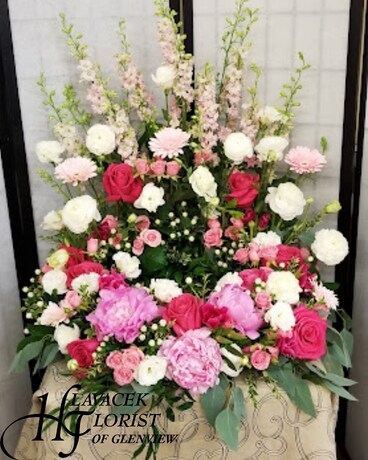 Graceful Urn Tribute Funeral Arrangement