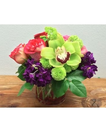 Vibrant Orchids And Roses Flower Arrangement