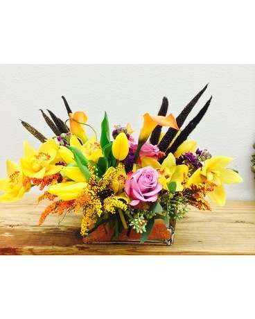 Sunny Orchids And Mini Calla Lilies Flower Arrangement
