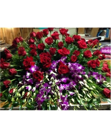 Red Roses and Orchids Sympathy Arrangement