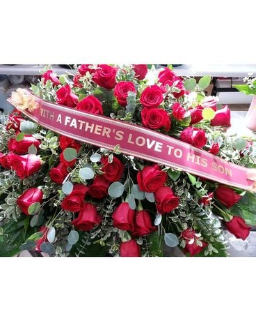 Red rose Casket Spray with red carnation accent Sympathy Arrangement