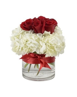 Refined Elegance Vase Arrangement size,  inches height and  inches wide.