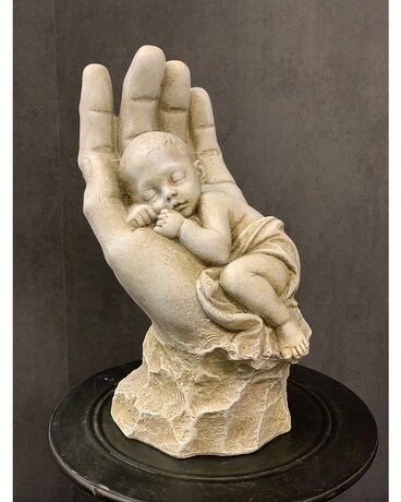 In His Palm Statue Flower Arrangement