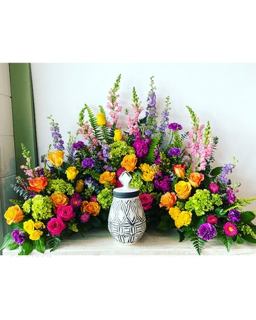 Colorful Urn Surround by Krueger Floral Flower Arrangement
