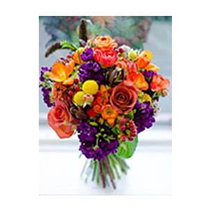 orange and purple vased arrangement