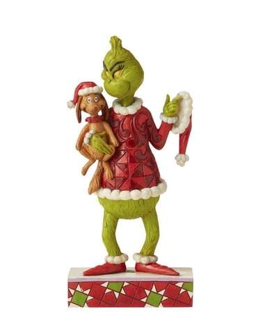 Grinch Holding Max Under Arm Gifts