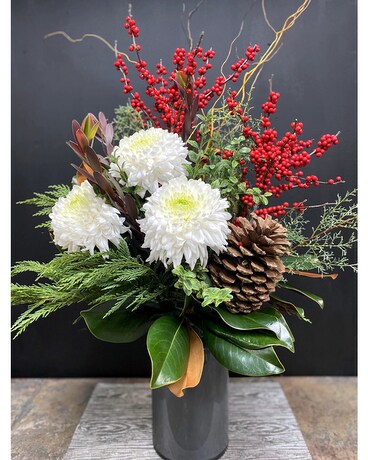Charming Wintergreens & Flowers Flower Arrangement
