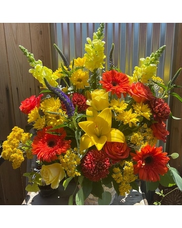 Orange and Yellow Basket Flower Arrangement