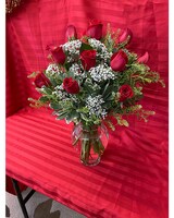 Standard (12 Roses) size,  inches height and  inches wide.